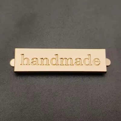 Custom engraved metal tags for fashion handbag branding with logo

