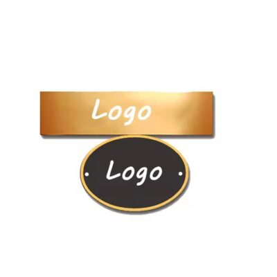 Close-up of a custom 3D engraved metal tag with detailed branding