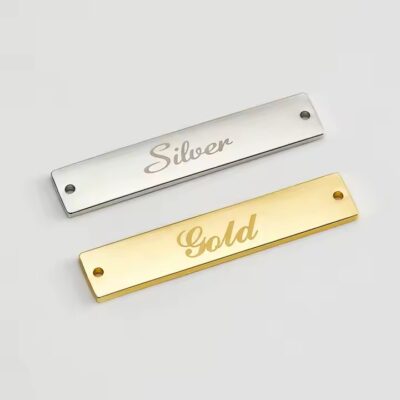 Engraved metal label tag for modern clothing branding
