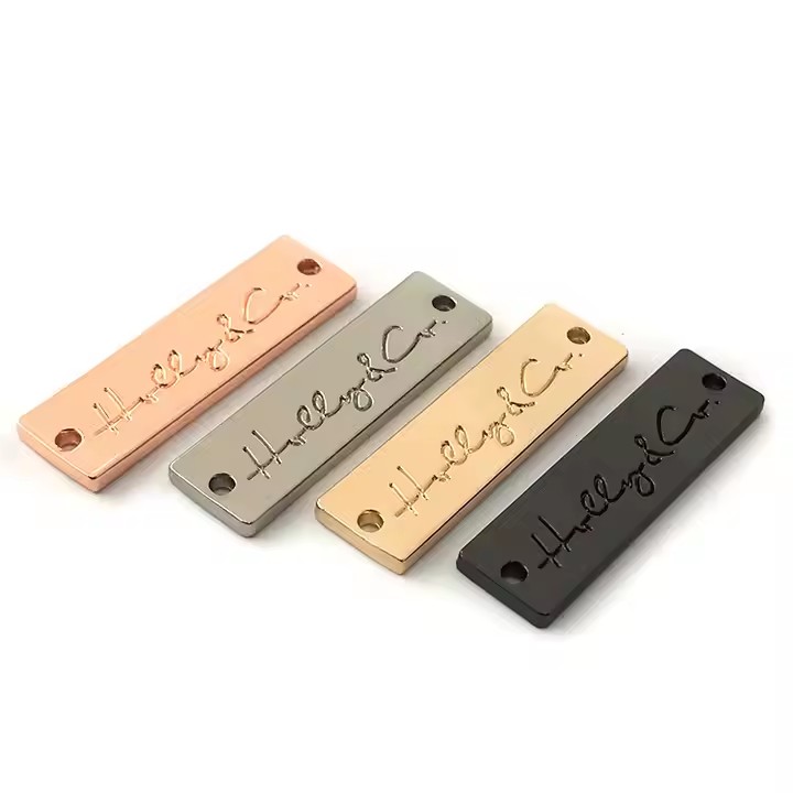 High-quality engraved metal tag for clothing and handbag branding