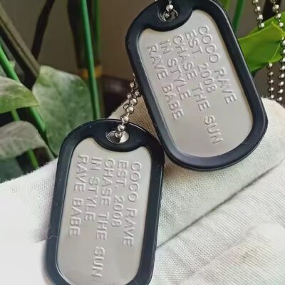 Personalized stainless steel dog tag with etched name and design