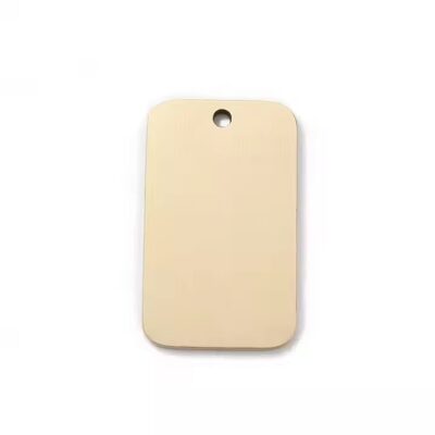 Brass dog tag necklace with copper label close-up