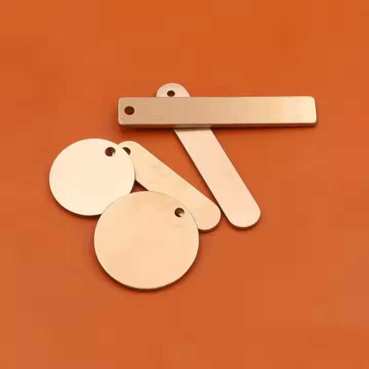 Round brass tag with copper label close-up