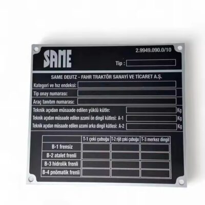 Custom black metal asset tag with printed equipment ID