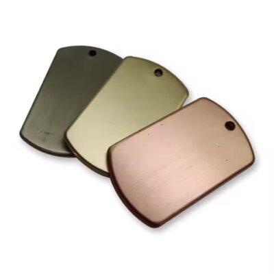 Blank rectangular brass card tag close-up