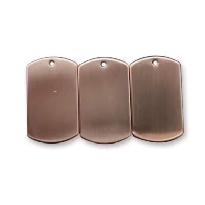 Blank rectangular brass card tag close-up