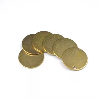 Custom stamped brass metal blanks close-up