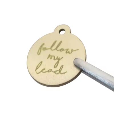Solid brass and copper tags close-up


