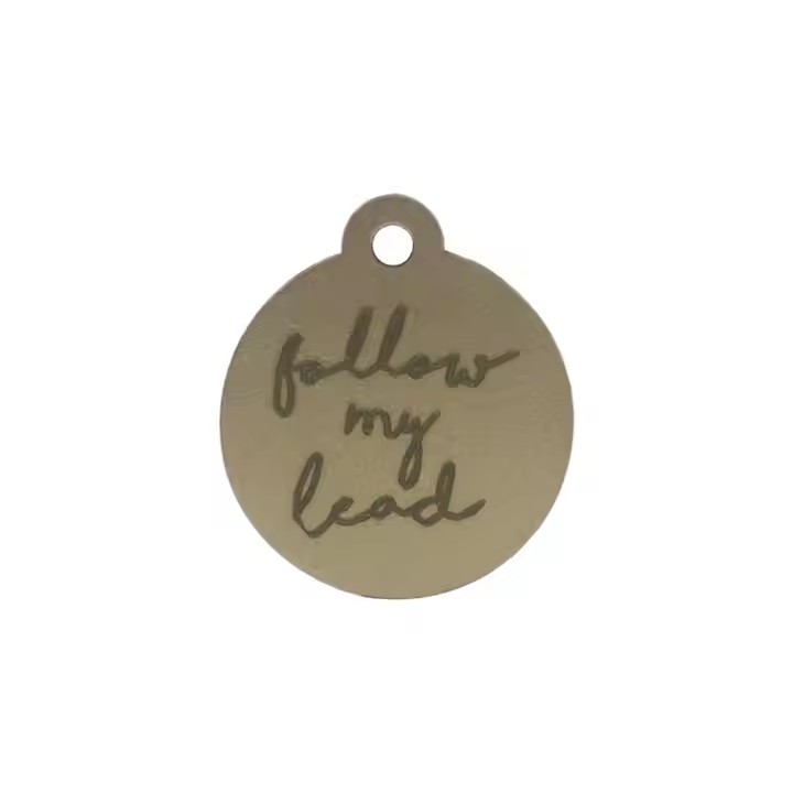 Solid brass and copper tags close-up