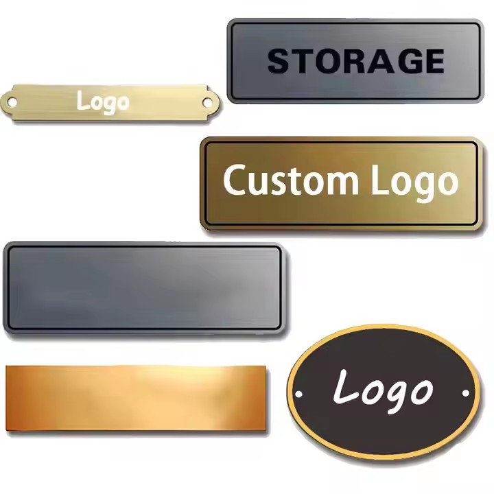 Elegant engraved metal tag featuring a luxury brand logo