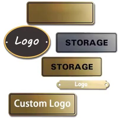 Elegant engraved metal tag featuring a luxury brand logo

