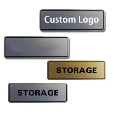 Elegant engraved metal tag featuring a luxury brand logo

