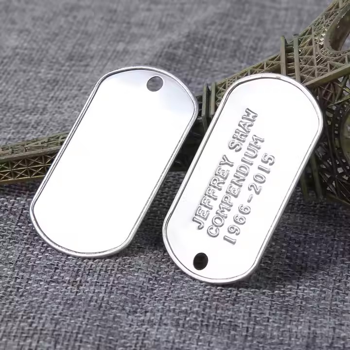 Custom stamped metal tag with personalized design