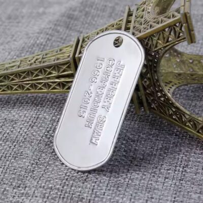 Custom stamped metal tag with personalized design