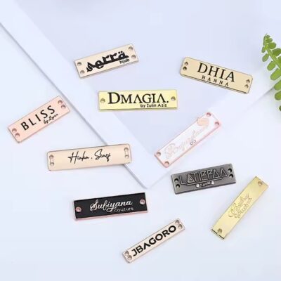 Fashion metal tags with custom letter engravings for clothing and bags
