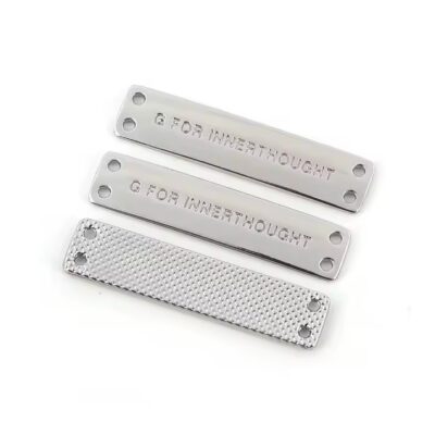 Fashion metal tags with custom letter engravings for clothing and bags